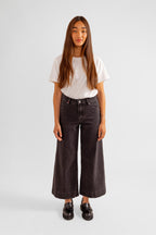 Jean évasé court noir FANNY femme, BLACK, taille 25, porté par Pauline (1m65) (F.A.M. JEANS) – photo 1